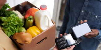 Paying for groceries Paying for groceries