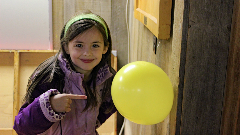 Girl Scout with balloon