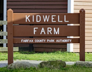 Kidwell Farm sign outside the farm's barn