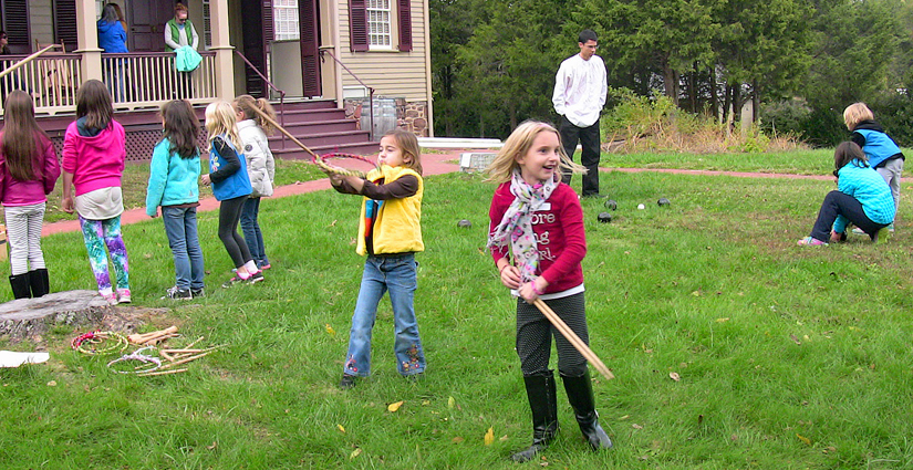 Girl Scouts take part in 18th century games on Sully's front lawn